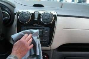 cleaning car dashboard