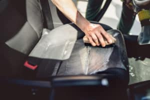 scrubbing car seat