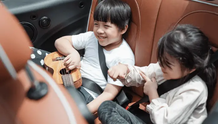 Kids sitting In Back Seat