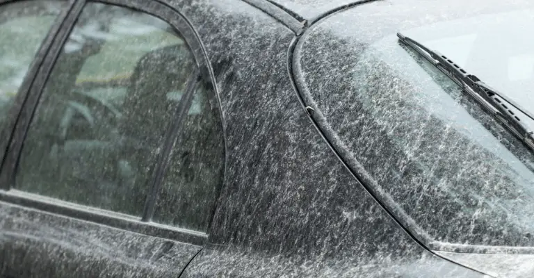 extreme examples of water spot build up on a car