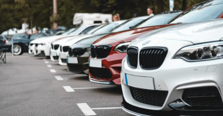 bmw cars ready for sale sitting on a used car lot