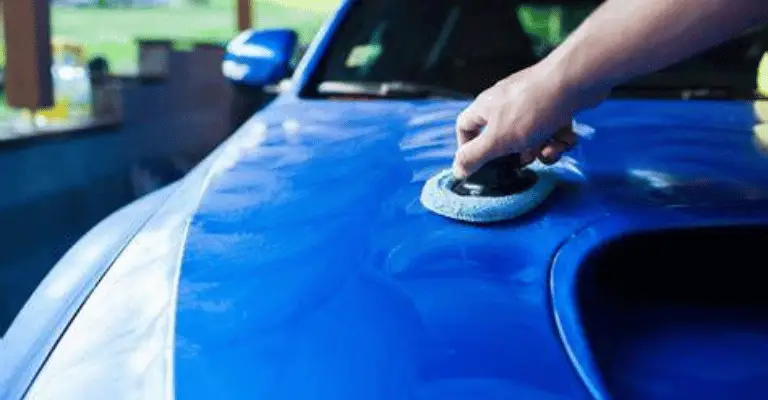 wax haze on a blue car