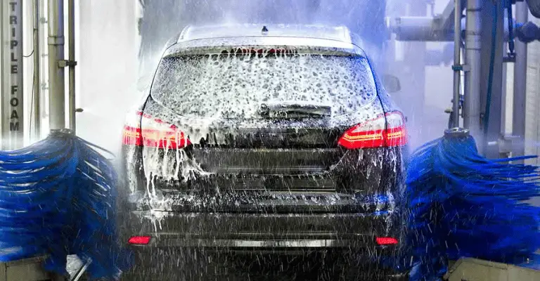 This is an example of a minivan going through an automatic car wash, not fully touchless, but it's a good example of the principals behind a touchless car wash damaging your car.